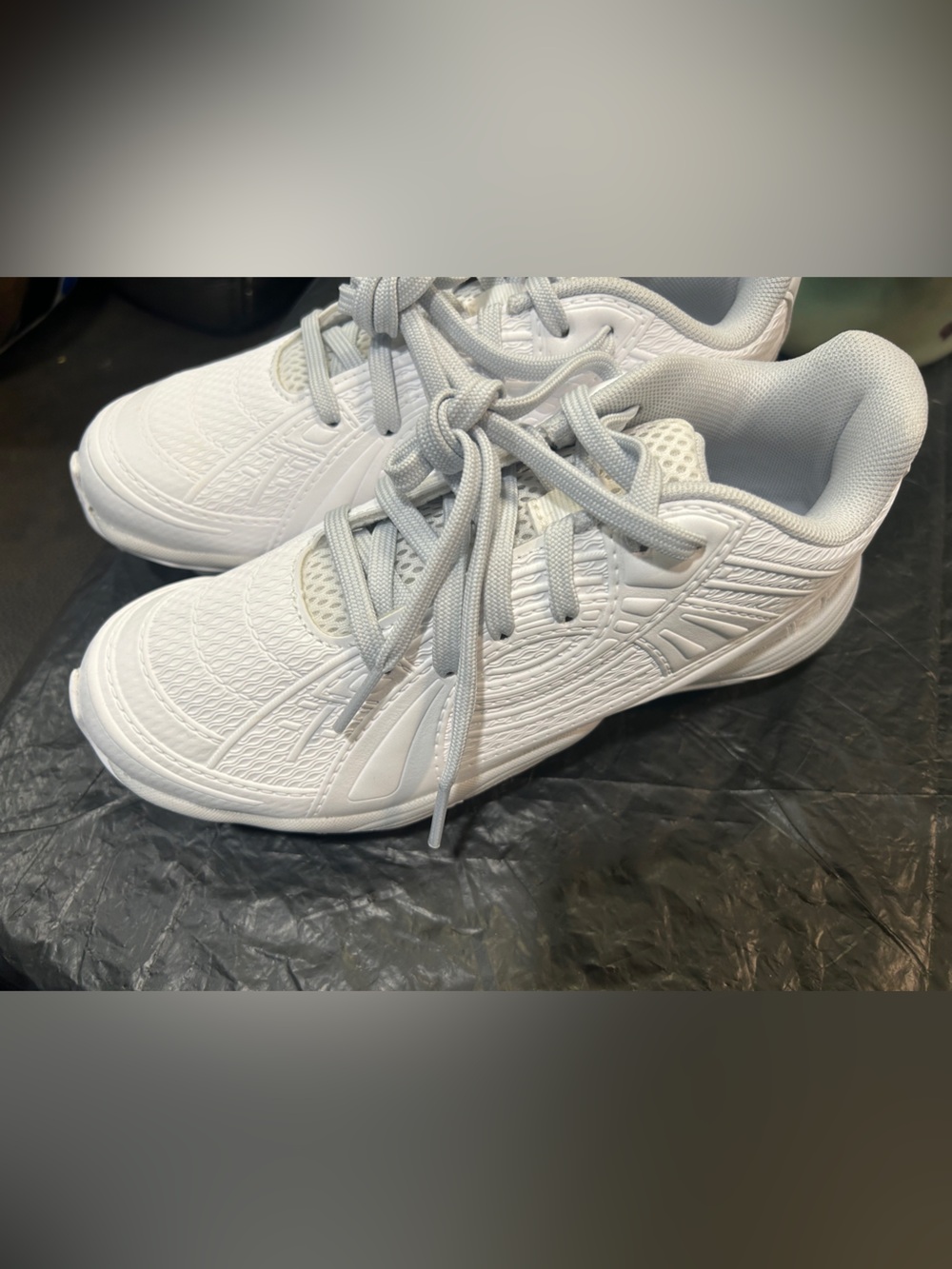 Under Armour Glyde Sola RM Softball Cleats in a clean, all-white colorway.